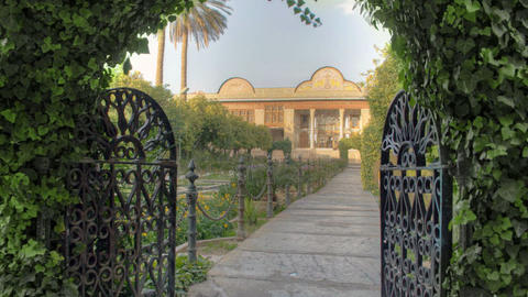 Persian garden in the Qavam House in Shiraz, Iran with a View of the yard and the building in Spring.