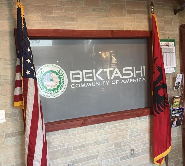 Sign for Bektashi Community of America with two flags on either side