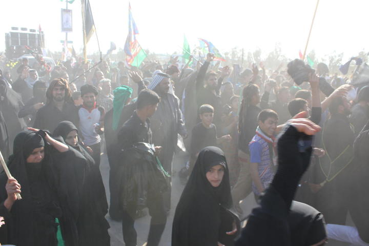 crowd walking, woman looking up